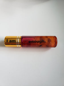 I am enough essential oil roll on with rose quartz and amethyst stones