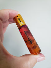 Load image into Gallery viewer, I am enough essential oil roll on with rose quartz and amethyst stones