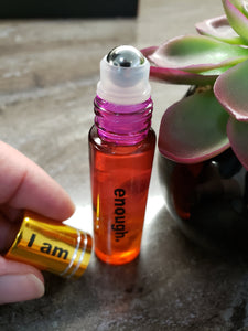 I am enough essential oil roll on with rose quartz and amethyst stones